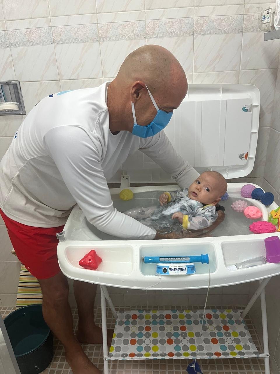 Newborn baby in early aquatic stimulation